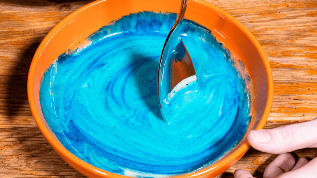 Add food coloring to make blue slime